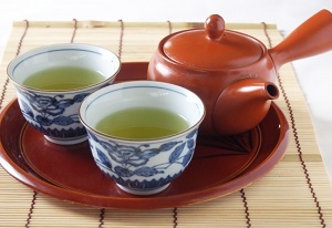 Two cups which Japanese tea is poured, and a Japanese teapot