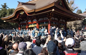 Bean-Throwing Ceremony at a temple. Many people try to get the beans.