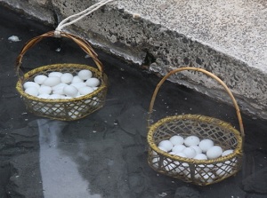 Boiling eggs in hot spring