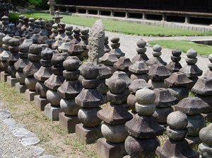 Stone pagodas in front of Gokurakudo